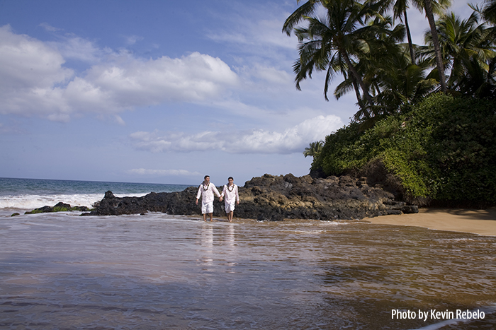 gay men walk on Maui Beach wedding