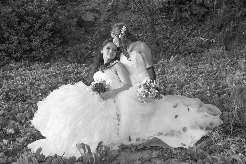 pretty brides in photo together in hawaii